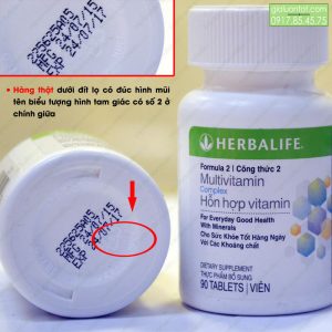 Dưới đáy lọ Vitamin Herbalife có hình mũi tên, biểu tượng hình tam giác